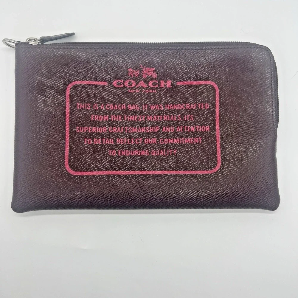 Coach Storypouch Pebbled Leather Zip Clutch Pouch Dark Burgundy Pink Creed Logo‎